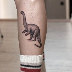 dinosaur fineline tattoo