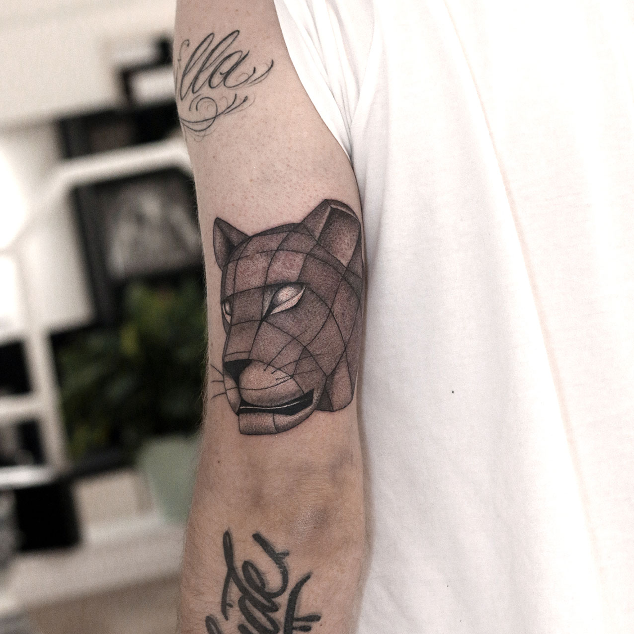 geometric lion tattoo