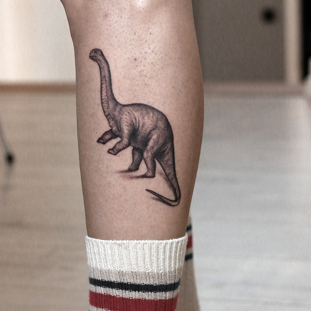 dinosaur fineline tattoo