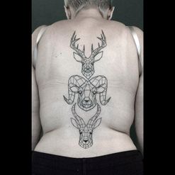 geometric backpiece tattoo